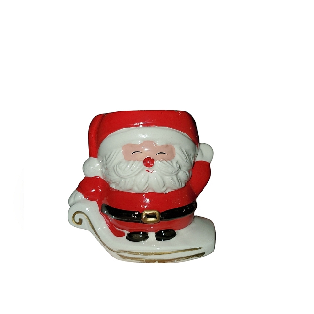 Vintage ceramic Santa with candle inside